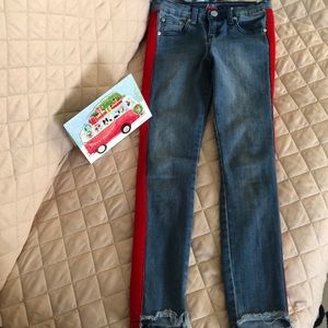 Blue jeans girls with red stripe on the side